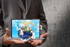 business-hand-holding-a-laptop